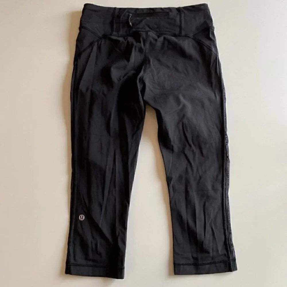 Lululemon Black Crops with Mesh Side Panel Size 6